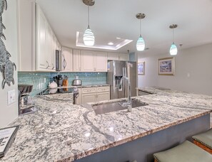 Fridge, microwave, coffee/tea maker, toaster