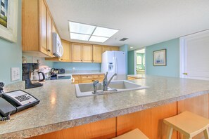 Fridge, microwave, coffee/tea maker, toaster