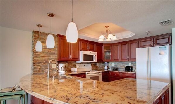 Fridge, microwave, coffee/tea maker, toaster