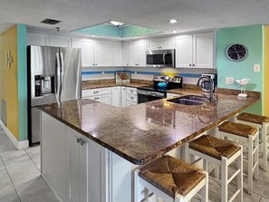 Fridge, microwave, coffee/tea maker, toaster