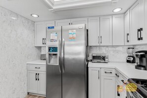 Fridge, microwave, coffee/tea maker, toaster