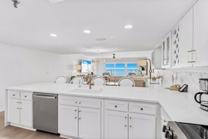 Fridge, microwave, dishwasher, coffee/tea maker