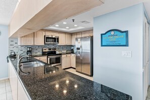 Fridge, microwave, coffee/tea maker, toaster