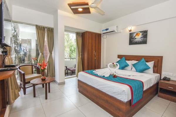 Premium bedding, memory foam beds, minibar, desk