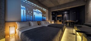 A modern hotel room with two beds, a dining area, and a kitchen. - US31 Yamanote Line a famous Japanese designer apartmentdirectly to Ueno2 minutes (荒川区)