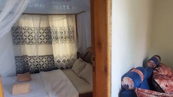 Standard Double Room, Balcony, Lake View | Bathroom | Shower, slippers, towels, soap