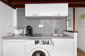 Fridge, microwave, stovetop, coffee/tea maker
