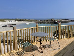 Suite, en-suite badkamer, uitzicht op zee (Balcony) | Beddengoed