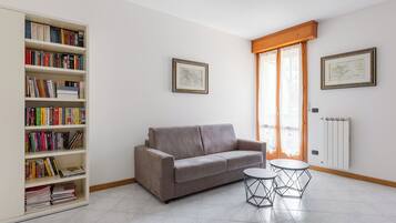 Condo, Balcony | Living area | 30-inch TV with digital channels
