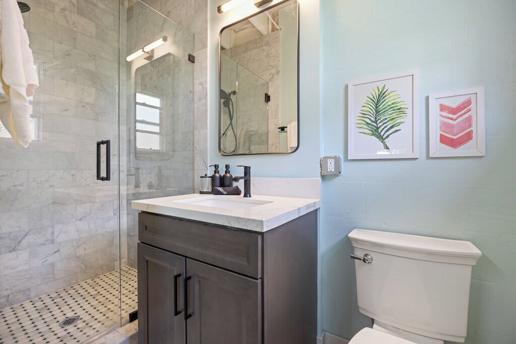 Shower, hair dryer, towels, shampoo