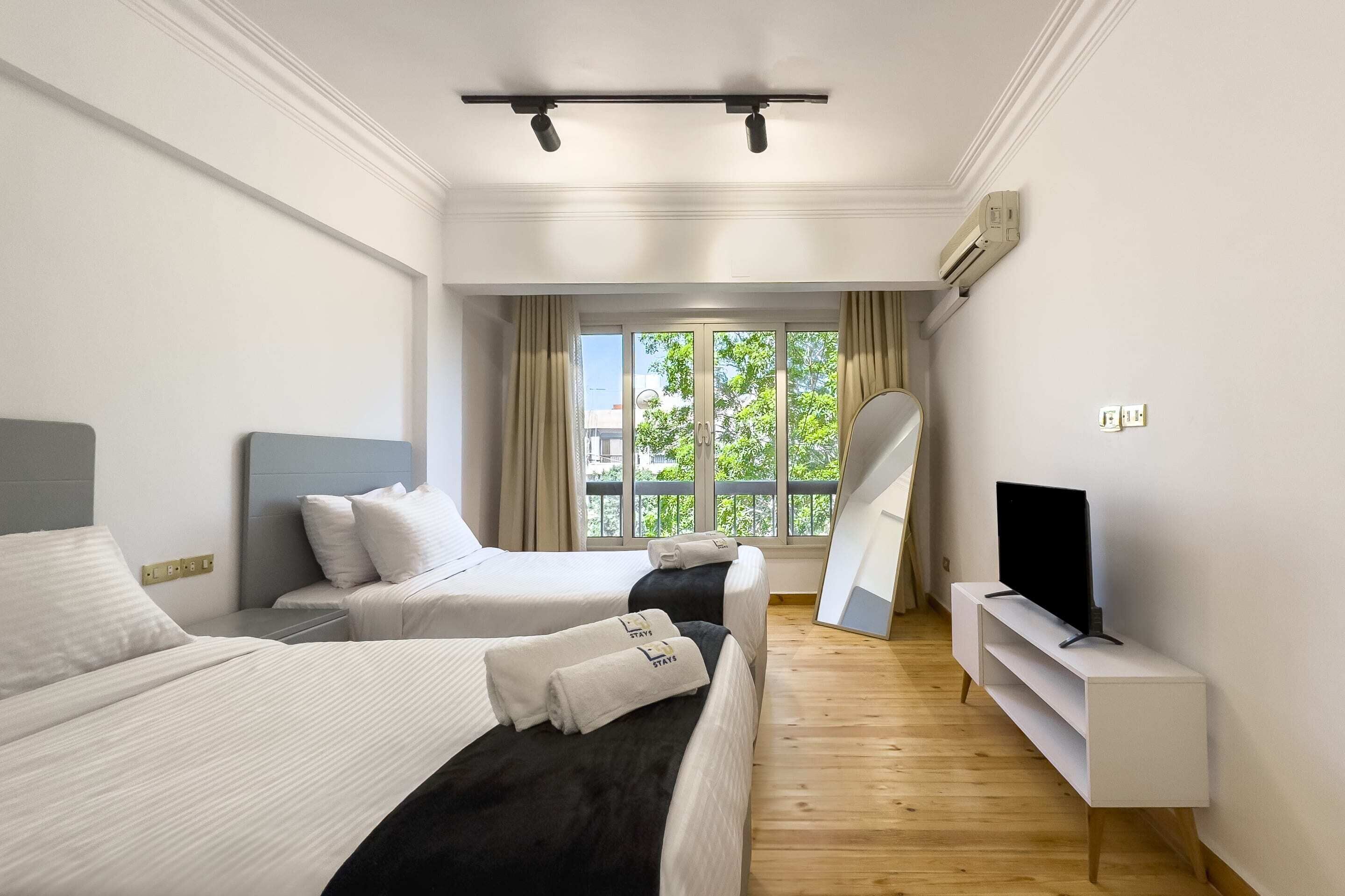 Apartemen Basic | 2 kamar tidur, setrika/meja setrika, dan seprai linen