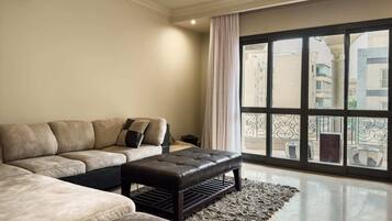 Basic Apartment | Living area | TV