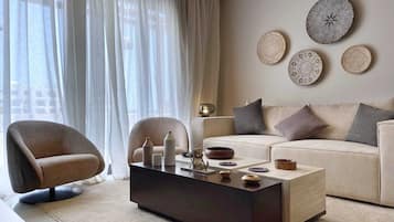 Basic Apartment | Living area | 65-inch Smart TV with digital channels