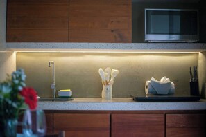 Fridge, microwave, stovetop, coffee/tea maker