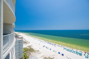 A beachfront hotel with a view of the ocean and a pier. - Phoenix Gulf Shores Ii 1702 3 Bedroom Condo (Gulf Shores)