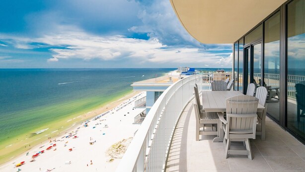 A balcony with a view of a beach and ocean. - Phoenix Gulf Shores Ii 2101 4 Bedroom Condo (Gulf Shores)