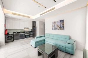 Basic Apartment | Living area | TV