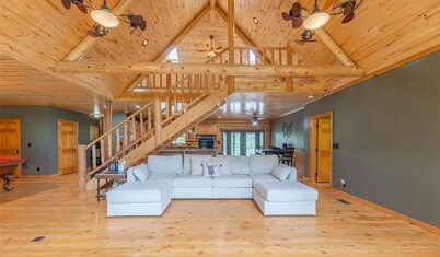 Private 5 BR cabin on 56 acres.  Hot tub, Hunt, fish, and near the lake and town