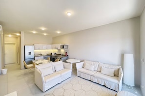 Basic Apartment | Living area | TV, fireplace