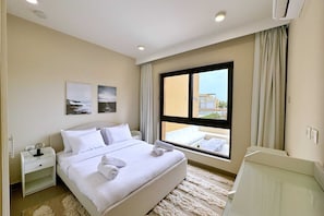 Apartamento básico | 1 quarto, ferros/tábuas de passar roupa, roupa de cama