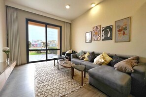 Apartamento básico | Área de estar | TV