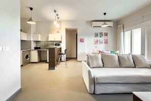 Appartamento Basic | Area soggiorno | Smart TV 55 pollici con canali via cavo