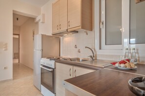 Refrigerador, horno, placa de cocina, cafetera/tetera