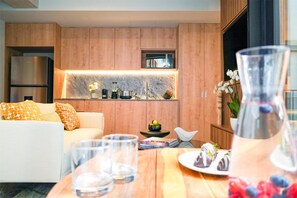 Minibar, desk, iron/ironing board