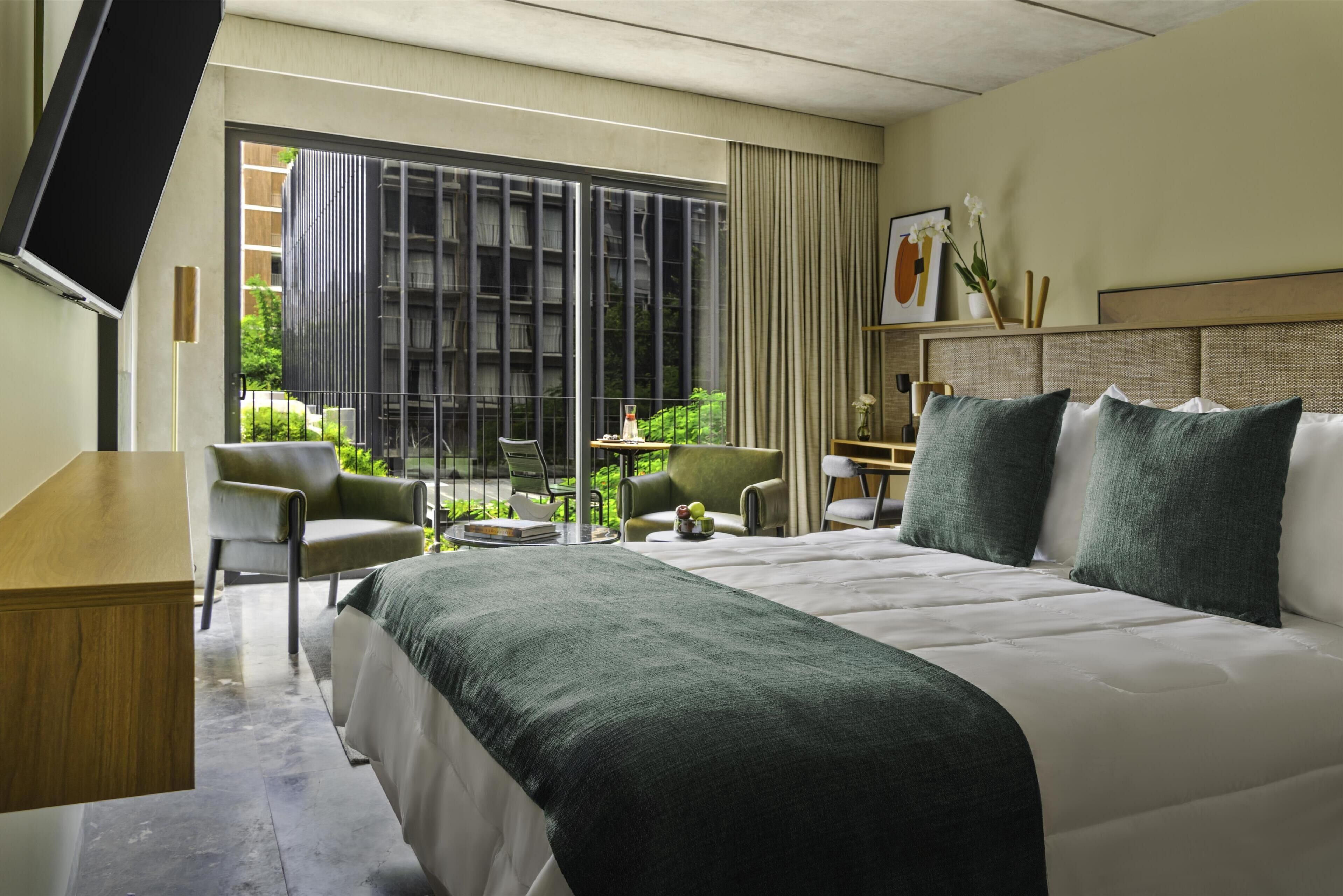 Studio, hjørnerom | Minibar, strykejern/-brett og sengetøy