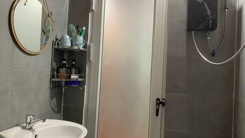 Double Room, Balcony, Lake View | Bathroom | Free toiletries, hair dryer, slippers, towels