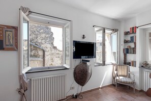 TV, fireplace - Holiday Home 'Montegrazie' with Sea View, Private Terrace and Wi-Fi (Montegrazie)