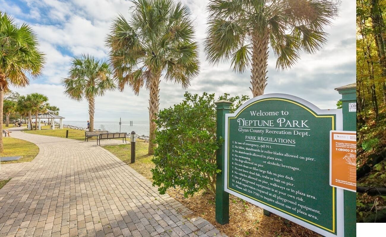 A sign welcoming visitors to Glynne County Recreation Dept. Deptune Park, with a paved walkway and palm trees in the background.
