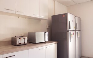 Family House, Patio | Private kitchen | Electric kettle, toaster