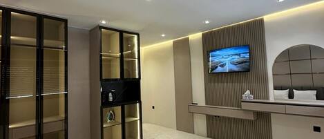 Luxury Studio Suite, City View | Living area | Printers