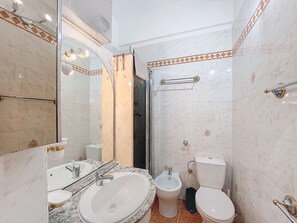 Regadera y secadora de cabello 