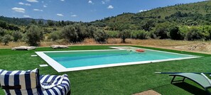 Seasonal outdoor pool, open 8:00 AM to 9:00 AM, pool umbrellas