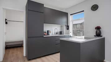 Apartamento | Cocina privada | Frigorífico, horno, lavavajillas y cafetera o tetera