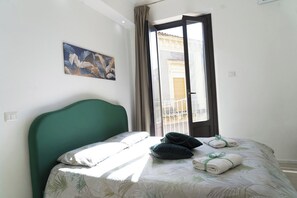 1 غرفة نوم ومكواة/لوح كي وواي فاي وملاءات أسرّة