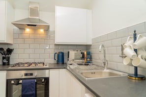 Fridge, microwave, oven, coffee/tea maker