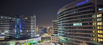 Burj khalifa overlooking night views, city views, sunrise relaxing from balcony