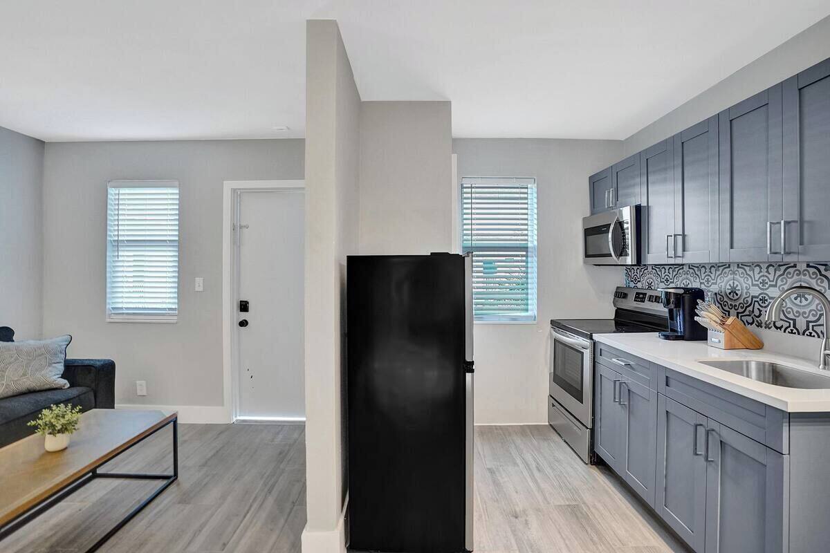 Quarto solteiro elite, 1 cama Queen, para não fumantes | Cozinha privada | Geladeira, micro-ondas, fogão, talheres/pratos/utensílios de cozinha