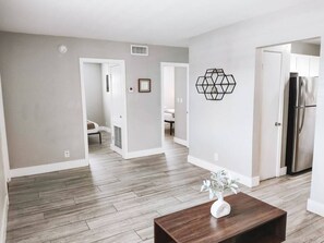 Habitación doble ejecutiva, varias camas | Área de sala de estar