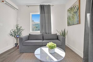 Classic Penthouse, 2 Bedrooms, Partial Ocean View (Eden 2301) | Living area - Eden by the Beach (Fort Lauderdale)