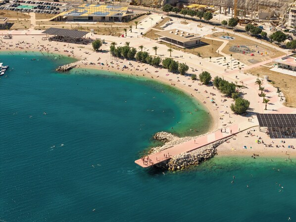 On the beach, sun loungers
