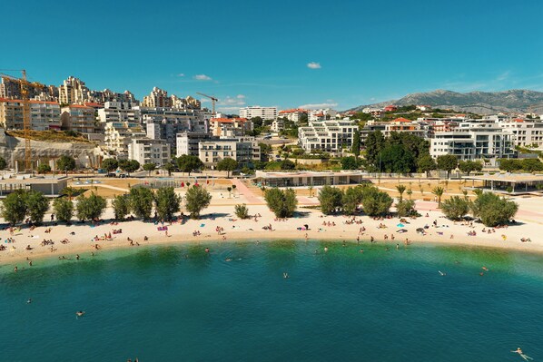 On the beach, sun loungers