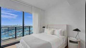 Luxury Condo, Multiple Beds, City View | Blackout drapes, iron/ironing board, free WiFi, bed sheets