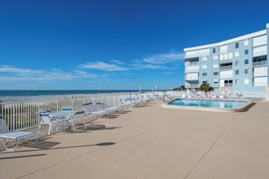 Outdoor pool, a heated pool - Cozy Beachfront 2-bedroom condo in tranquil Indian Shores (Indian Shores)