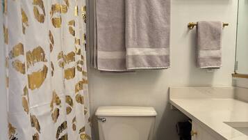 Hair dryer, towels, soap, shampoo