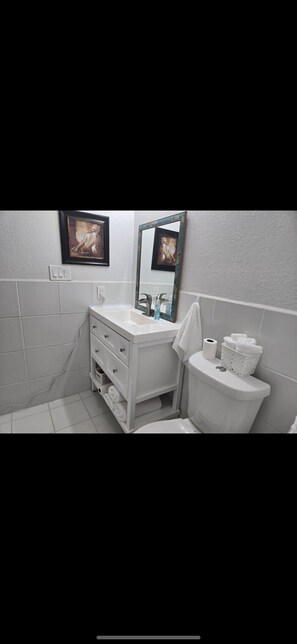 Hair dryer, towels, soap, toilet paper