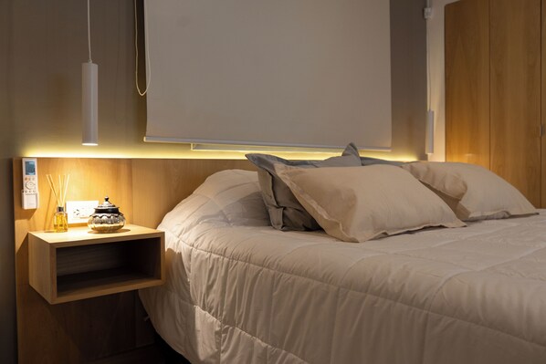 Chambre Deluxe | Minibar, coffres-forts dans les chambres, bureau